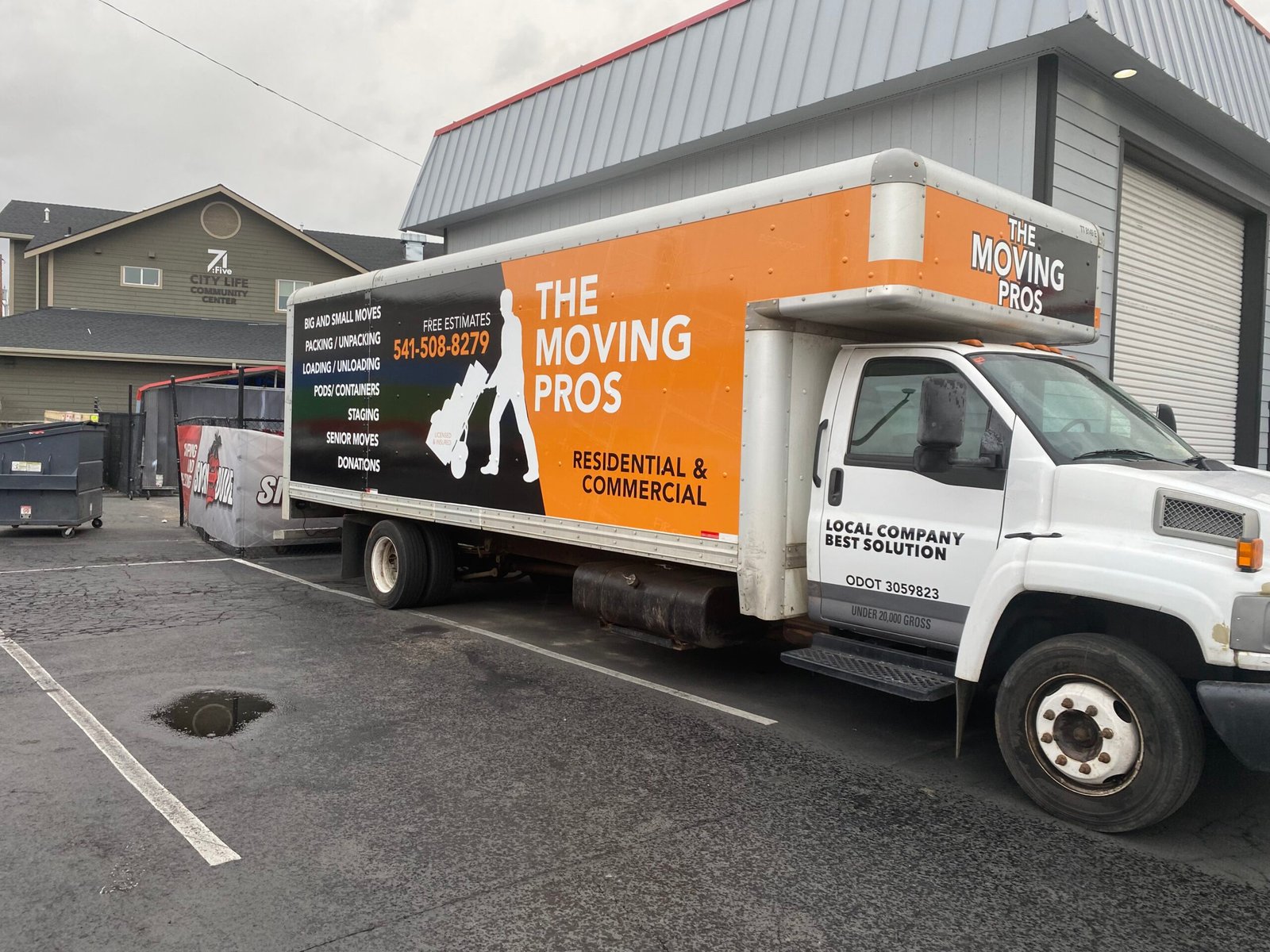 The Moving Pros truck ready for a commercial move