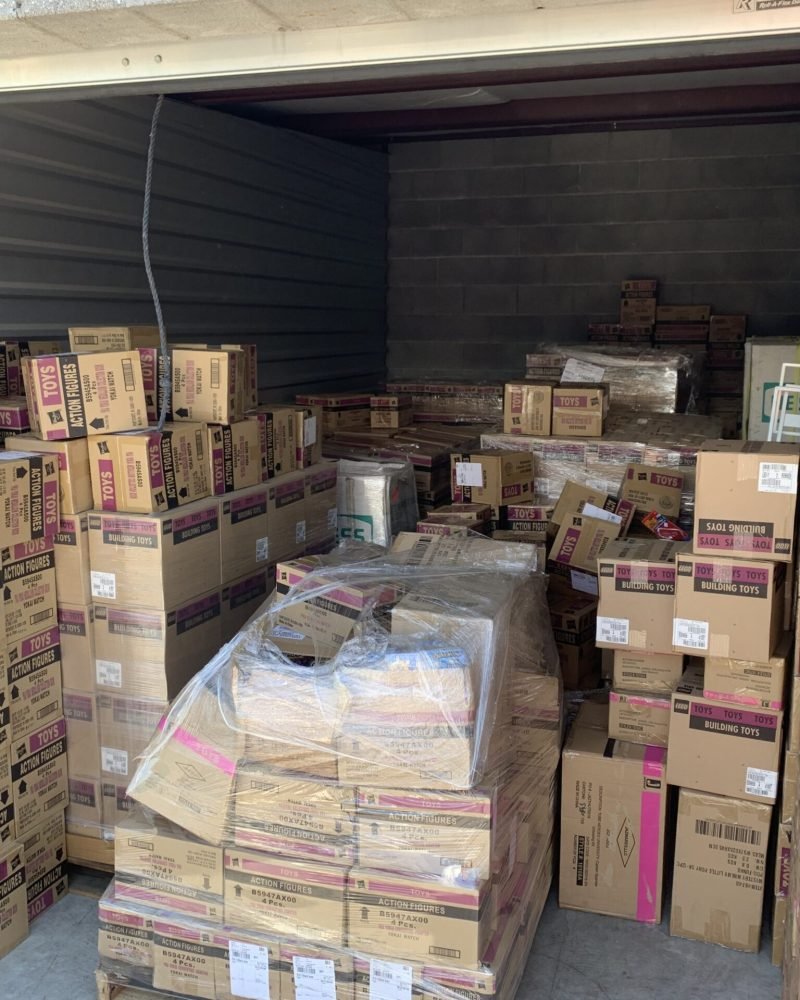 Load and unload service in Southern Oregon with organized storage unit full of labeled moving boxes